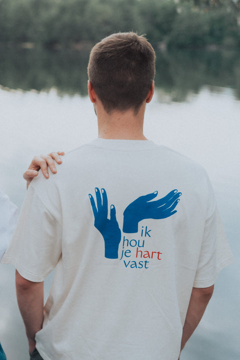 Uniseks T-shirt 'ik hou je hart vast' - blauw