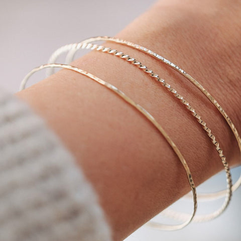 Set van drie armbanden 'draad van Ariadne' (massief goud)