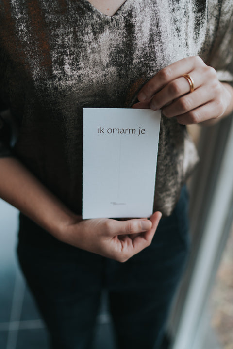 'Ik omarm je': gedicht