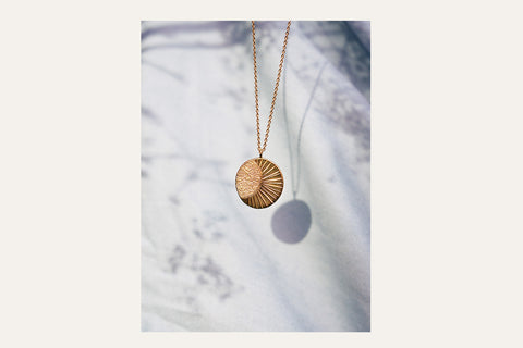 Halsketting De tuimelaar - zon & maan (verguld)