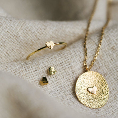 Eén oorring "coeur" (18k massief goud)