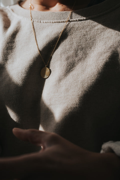 Halsketting De tuimelaar - zon & maan (verguld)